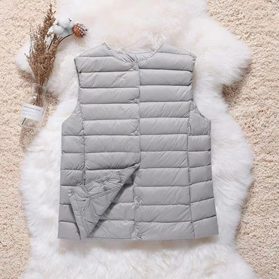 Artic - Gilet en coton plissé avec plumes de canard blanches
