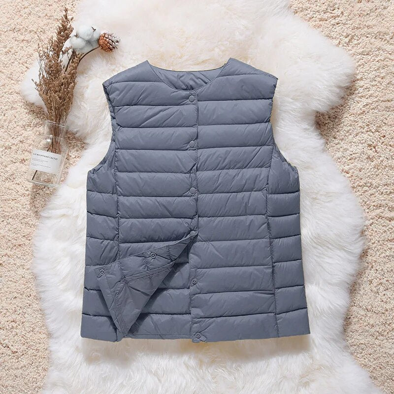 Artic - Gilet en coton plissé avec plumes de canard blanches
